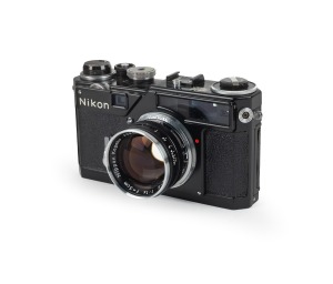 NIPPON KOGAKU: Rare black-body Nikon SP rangefinder camera [#6218993] with&nbsp;Nikkor-S&nbsp;50mm f1.4 lens [#409620], c. 1960.