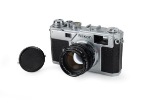 NIPPON KOGAKU: Nikon S3 rangefinder camera [#204707] with&nbsp;Nikkor-S 50mm f1.4 lens [#204781] and Nippon Kogaku&nbsp;lens cap, c. 1958.
