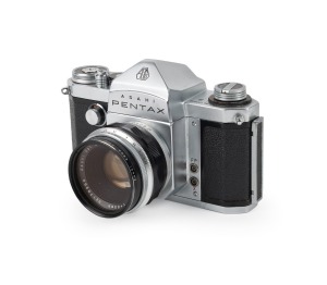 ASAHI KOGAKU: Pentax S SLR camera [#170219] with Takumar 55mm f2.2 lens [#178969], Asahi UV lens filter, and Asahi Kogaku leather case, c. 1961.