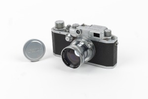 CANON: Canon IIB rangefinder camera [#32900] with Canon Serenar 50mm f1.9 lens [#29148], Canon lens cap, and Canon leather case, c. 1950.
