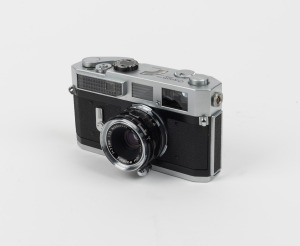 CANON: Canon 7 rangefinder camera [#928103] with Sankyo Kohki W-Komuru 35mm f2.8 lens and Canon leather case, c. 1962.