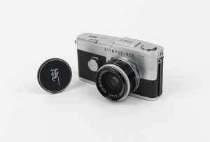 OLYMPUS: Pen-F half-frame SLR camera [#291331] with E. Zuiko Auto-W 25mm f4 lens [#114155], Olympus lens cap, and Olympus-Pen F leather case, c. 1964.
