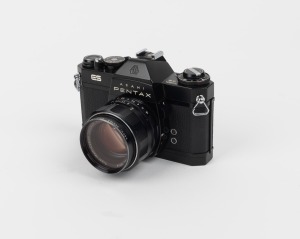 ASAHI KOGAKU: Black-body Pentax ES SLR camera [#6509871] with SMC Takumar 50mm f1.4 lens, Asahi Pentax Skylight lens filter, and Asahi Pentax leather case, c. 1972.