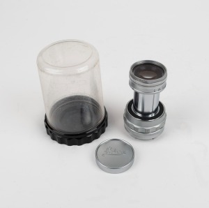 LEITZ: Bayonet-mount collapsible Elmar 90mm f4 lens [#1387201] with Leitz UVa lens filter, Leica lens cap, and Leitz lens container.