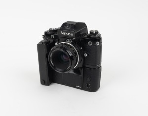 NIPPON KOGAKU: Nikon F3 SLR camera [#1981817] with&nbsp;Nikkor 50mm f2 lens [#3551435] and Nikon MD-4 Motor Drive [#373685], c. 1980.