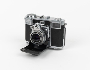 ZEISS IKON: Contessa 35 (533/24) folding rangefinder camera [#T97686] with Zeiss Opton Tessar 45mm f2.8 lens [#609815], Synchro-Compur shutter, and Zeiss Ikon leather case, c. 1952.