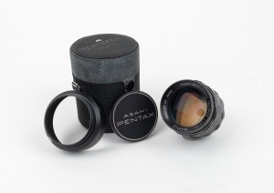 ASAHI KOGAKU: SMC Takumar 85mm f1.8 lens [#5699748] with Asahi Pentax front and rear lens caps, Asahi Pentax lens hood, Asahi lens case, and maker's box, c. 1960s.