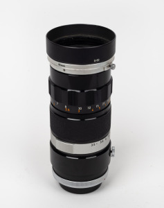 CANON: Canon FL 55-135mm f3.5 lens with Canon rear lens cap and Canon S-60 lens hood.