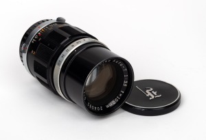 OLYMPUS: E. Zuiko 100mm f3.5 lens with front and rear lens caps.