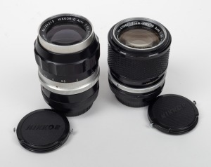 NIPPON KOGAKU: Group of two F-mount lenses with Nikon front and rear lens caps - one Nikkor-Q Auto 135mm f3.5, together with one Zoom-Nikkor Auto 43-86mm f3.5. (2 items)