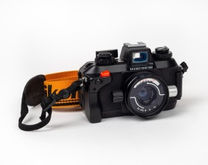 NIPPON KOGAKU: Nikonos IV-A underwater camera with&nbsp;Nikkor 35mm f2.5 lens and Nikon strap, c. 1980.