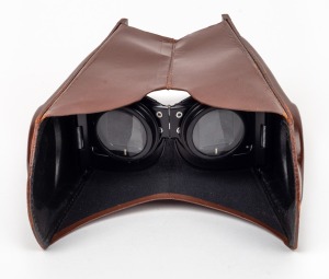 ROLLEI: Leather binocular folding focusing hood, for use with Rollei TLR cameras.