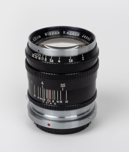 NIPPON KOGAKU: Bayonet-mount Nikkor-P&middot;C 85mm f2 lens [#497299] with Nippon Kogaku rear lens cap.