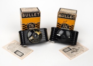 KODAK: Special edition 1939 New York World's Fair Bullet 127 film camera in maker's box (one of only ten thousand produced, per McKeown's), together with one standard Kodak Bullet, also in maker's box. (2 items)