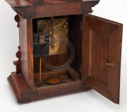 An antique American timber cased mantle clock with eight day time and coil gong striking movement, 19th/20th century, 37cm high. - 2