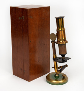 An antique brass microscope in mahogany case, 19th century, ​​​​​​​the case26cm wide.