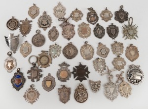 1 · A collection of mainly early 20th Century silver award fobs; different sports and events, many unengraved. (Total: 40 items; approx 240g).