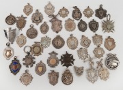 A collection of mainly early 20th Century silver award fobs; different sports and events, many unengraved. (Total: 40 items; approx 240g).