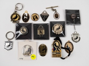 COLLINGWOOD: A small collection of fobs and badges including a 1940s lapel pin, 1940s-50s tin badges and a fob on a silver chain, later membership fobs, a 10 Year Premier Pass, etc. (15 items).