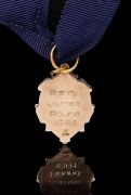 THE 1981 BROWNLOW MEDAL, 9ct gold, blue enamel, engraved verso 'Barry James Round 1981'. - 2
