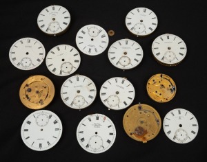 Assorted antique pocket watch movements and dials, Australian retailer. 19th/20th century, (qty).