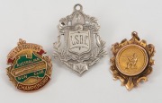 SHOOTING: RIFLE & GUN CLUB AWARDS: a 1964 Australian Gun Club Championship award badge in gold and enamel (9ct, 7.85g) by K.G. Luke; an undated Rifle Club award in gold (9ct, 2.45gms) circa 1910; also, a sterling silver award fob (6.2gms) to B.Hay from th