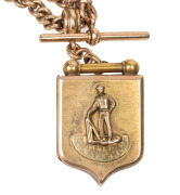 A 9ct gold presentation locket suspended from a 9ct rose-gold chain, (total approx.35g), the back of the locket engraved "R.E.C.C. VICE-PRESIDENT'S PRIZE Presented to W. MARSHALL For Best Allround PLAY - Season 1887-8". - 2