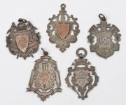 A group of silver (and silver+gold) award fobs to E.L. WAKELING, comprising of 1905-6 Bowling award (Glenlyon C.C.), 1905-6 Premiers (Glenlyon C.C.), 1907-8 Premiers (East Brunswick C.C.), 1908-9 Premiers (East Brunswick C.C.) and 1907 Best Field Umpire (