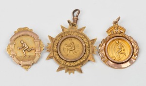 FOOTBALL: Various 1920s awards in gold (9ct, 14+g total.), engraved "VICTORIA F.C. Runners Up 1925 - T. HENDERSON"; "E.S.S.F.A. All Age - Won by J. LYONS - 1927"; and, "T.F.C. Premiers 1928 - A.W. ENGLEMAN". (3 items).
