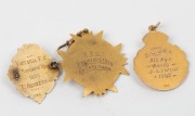 FOOTBALL: Various 1920s awards in gold (9ct, 14+g total.), engraved "VICTORIA F.C. Runners Up 1925 - T. HENDERSON"; "E.S.S.F.A. All Age - Won by J. LYONS - 1927"; and, "T.F.C. Premiers 1928 - A.W. ENGLEMAN". (3 items). - 2