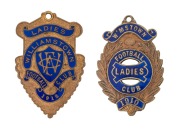 WILLIAMSTOWN FOOTBALL CLUB: 1910 and 1912 "LADIES" Membership fobs made by Bentley; a 1913 Membership fob made by Bridgland & King; a 1950s membership badge made by K.G. Luke, and a 1950's Argus tin badge. A scarce group. (5 items). - 2