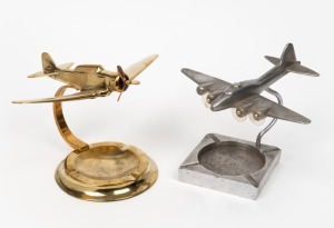 Two vintage aeroplane desk ornament ashtrays, in brass and aluminium, mid 20th century, 23cm and 20cm wingspans