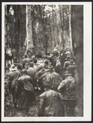 Nine c. 1940s press agency photographs, featuring the 1947 Caulfield Cup, Daredevil Curtis motorcycle jump at the Melbourne Exhibition Speedway, Australian Alps search and rescue volunteers in action, French Island koala colony transfer to Healesville, an - 5