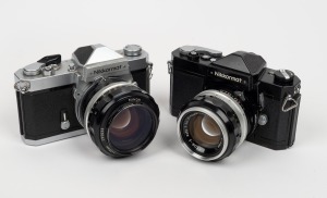NIPPON KOGAKU: Group of two cameras - one black-body Nikkormat FT with Nikkor-S Auto 50mm f1.4 lens, together with one chrome-body Nikkormat FT with Nikkor-S&middot;C Auto 55mm f1.2 lens. (2 items)