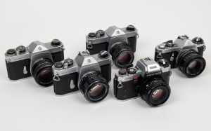 ASAHI KOGAKU: Group of five cameras - one Pentax SP with SMC Takumar 55mm f2 lens, one Pentax SP-F with SMC Takumar 50mm f1.4 lens, one Pentax SP1000 with SMC Takumar 55mm f1.8 lens, one Pentax ME with Auto Chinon 50mm f1.9 lens, and one Pentax Program A 