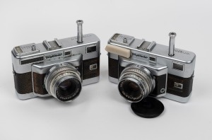 VOIGTL&Auml;NDER: Group of two Vitessa T viewfinder cameras, both with Color-Skopar 50mm f2.8 lenses, one with lens and light meter caps, c. 1956. (2 items)