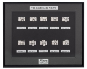 NIPPON KOGAKU: Commemorative display titled 'The Legendary Nikons' featuring an array of embossed pins depicting various iconic Nikon cameras from throughout the history of the company, such as the 1948 Nikon I, the 1959 Nikon F, and the 1988 Nikon F4; fr