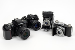 VARIOUS MANUFACTURERS: Group of four cameras - one Balda Baldinette, one Kodak Retinette (012), one Nikon F-601 AF, and one Ricoh XR-P Multi-Program. (4 items)