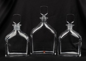 ORREFORS set of three vintage Swedish glass decanters in two sizes, 20th century, 25cm and 29cm high