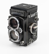 ROLLEI: Rolleiflex 2.8F TLR camera [#2457761], c. 1956, with Carl Zeiss Planar 80mm f2.8 lens [#4350568], together with leather casing. - 2