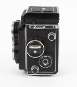 ROLLEI: Rolleiflex 2.8F TLR camera [#2457761], c. 1956, with Carl Zeiss Planar 80mm f2.8 lens [#4350568], together with leather casing. - 3