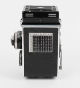 ROLLEI: Rolleiflex 2.8F TLR camera [#2457761], c. 1956, with Carl Zeiss Planar 80mm f2.8 lens [#4350568], together with leather casing. - 4