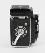 ROLLEI: Rolleiflex 2.8F TLR camera [#2457761], c. 1956, with Carl Zeiss Planar 80mm f2.8 lens [#4350568], together with leather casing. - 5