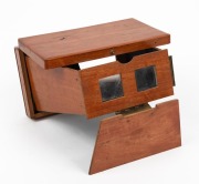 18.5 x 10.5 x 4cm collapsible wooden pocket stereoscope, c. 1890s, marked 'H. E. MARQUE de FABRIQUE'.