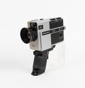 BOLEX-PAILLARD: Jubilee Super 8 movie camera, c. 1977, in maker's box with instruction booklet, remote control, and wrist strap attachment. - 3