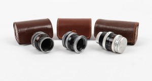 BOLEX-PAILLARD: Three lenses, each in leather case - one Pizar 5.5mm f1.9 with front and rear caps, one Yvar 13mm f1.8 with rear cap, and one Yvar 13mm f1.9 with rear cap. (3 lenses)