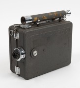 DEVRY: Circa 1926 35mm hand-cranked Devry 'Lunchbox' Standard Portable Camera, with Wollensak Velostigmat f2.8 lens and internally-stored locking lens cap. - 2
