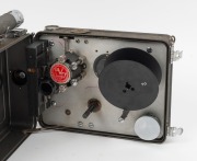 DEVRY: Circa 1926 35mm hand-cranked Devry 'Lunchbox' Standard Portable Camera, with Wollensak Velostigmat f2.8 lens and internally-stored locking lens cap. - 3