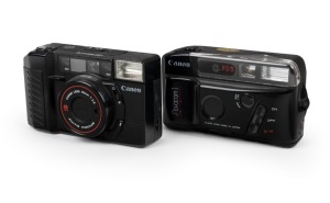 CANON: Circa 1980s AF35M II point-and-shoot camera, together with one replica CANON Novacam I. (2 cameras)