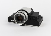 FOTOCHROME: Fotochrome Color Camera viewfinder camera, c. 1965, ostensibly in mint-condition in maker's box with lens cap and wrist strap.
